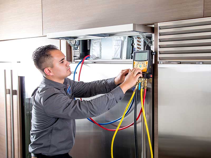 A semi-annual refrigerator condenser cleaning keeps your refrigerator running smoothly